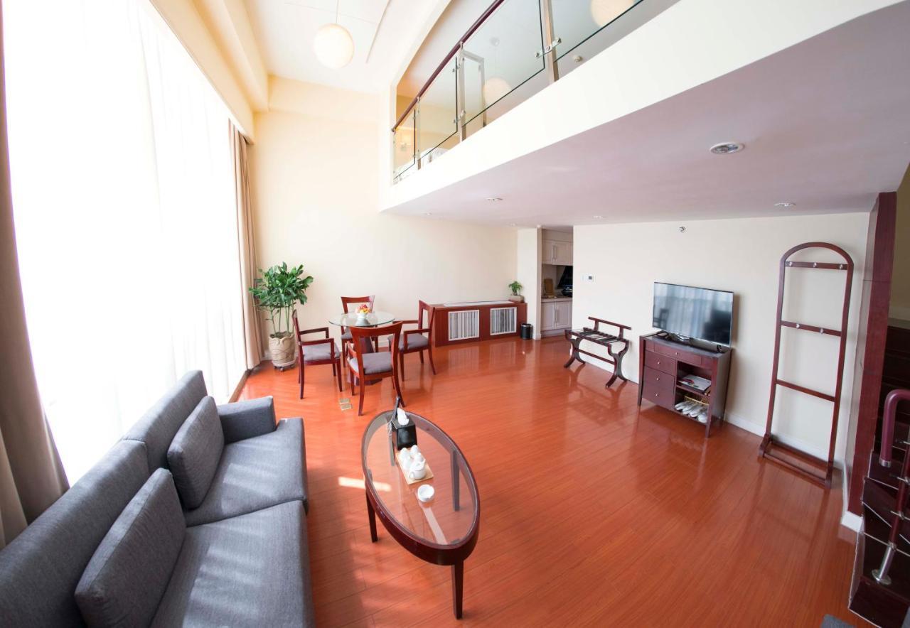 Yantai Meiya International Aparthotel Экстерьер фото