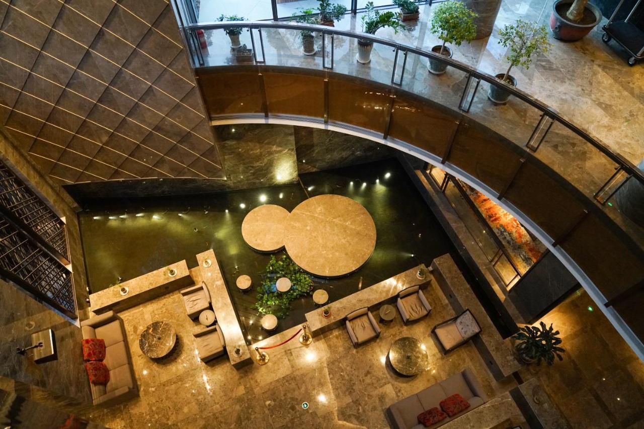 Yantai Meiya International Aparthotel Экстерьер фото